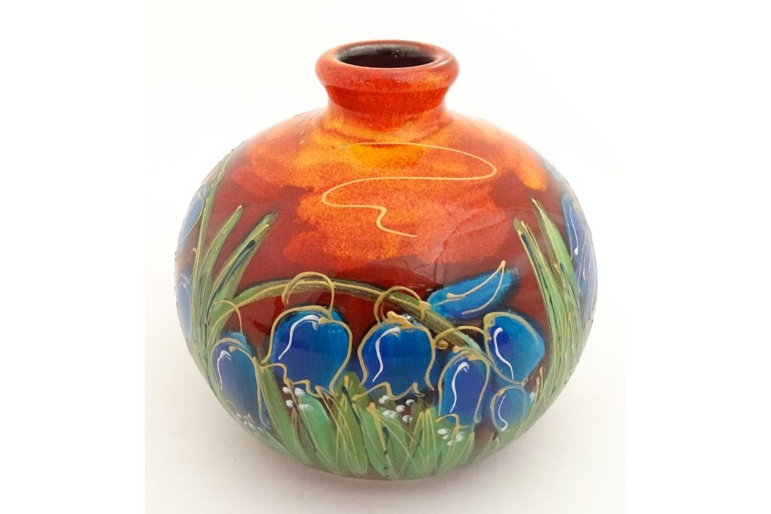 An Anita Harris green glazed vase of squat form decorated with Bluebells. Signed under. Approx. 3 - Image 1 of 8