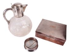 A LATE VICTORIAN SILVER CLARET JUG