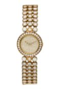 HARRY WINSTON: AN 18CT GOLD DIAMOND ENCRUSTED BRACELET WATCH