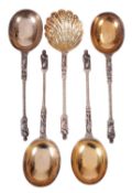 A SET OF FOUR LATE VICTORIAN SILVER SERVING SPOONS