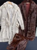 A FUR STOLE, A SILVER FOX COAT AND A MINK COAT