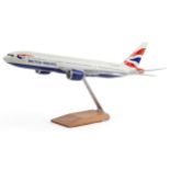 A Pacific Miniatures Boeing 777-23BER 1:100 scale model plane on stand, 28cm H x 65cm W x 61cm D.