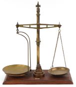 A Roberts & Co. Ltd. of London, set of brass and mahogany balance scales, 56cm high.