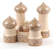 20th century pottery storage jars in the form of a Middle Eastern temple, 30cm high.