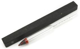 Unusual glass hydrometer, with a lead weighted tip, detailed in red 22170, the paper scale 9cm long,