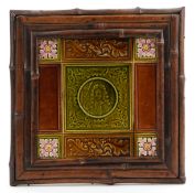 19th century Wedgwood pottery tile relief moulded with a gentleman, within a bamboo design frame,