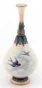 Early 20th century Royal Worcester bottleneck vase hand painted with swallows, moulded in relief