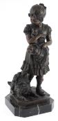 After F Barbedienne, a bronze figure of a young female carrying puppies, with a seated dog, raised