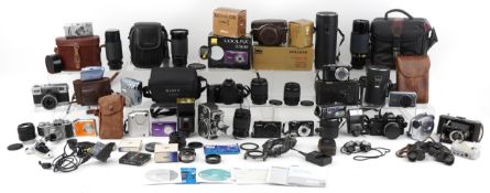Vintage and later cameras, accessories and lenses including Nikon, Canon EOS 3000 and Bolex