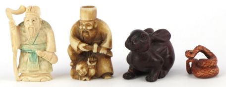 Four Japanese netsukes comprising a boxwood hare, serpent and two bone elders, the largest 5cm