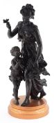 Bronzed spelter figure of a maiden and child with a flower basket, 50cm high.