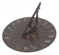 Late 19th/early 20th century bronze sundial, 30cm in diameter.