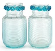 Pair of Victorian pale blue glass beaker vases, circa 1880, each with a wave form frilly rim,