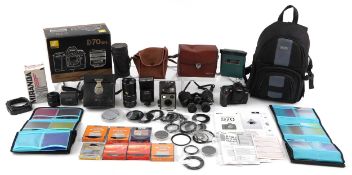 Vintage and later cameras and binoculars including Nikon D70 and Tasco binoculars model number 101.