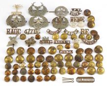 Collection of military interest shoulder titles, uniform buttons and Scottish cap badges of