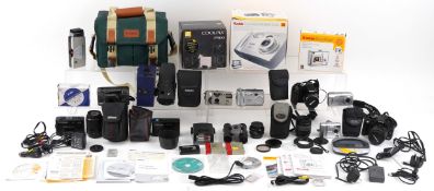 Collection of vintage and later cameras including Canon EOS 350D, Nikon Coolpix P500 digital