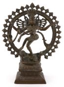 Large antique Indian brass study of Shiva within a ring of flames, 64cm high, 16.5KG.