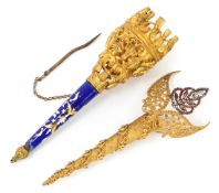 Two 19th century gilt Tussie Mussie posy holders, one enamelled, the largest 12cm high.