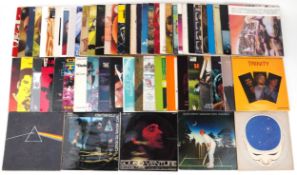 Collection of vinyl LP records, some sealed, including Led Zeppelin, The Beatles, Pink Floyd,