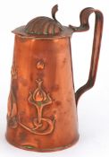 Joseph Sankey & Sons Art Nouveau copper tankard with repoussé tulip decoration, 17cm high.
