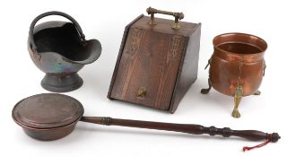 Antique fireside tools including a two coal scuttles and a bed warming pan, the largest 110cm in