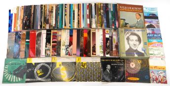 Collection of vinyl LP records including Bruce Springsteen, The Bee Gees, Julien Clerc, Duran