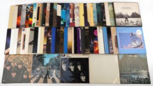 Collection of vinyl LP records including George Harrison, John Lennon and Yoko Ono, Free, Elton