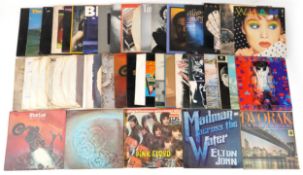 Collection of vinyl LP records including Pink Floyd, Elton John, Wham!, Bob Dylan, Neil Diamond,