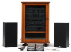 Vintage Sanyo HiFi stereo system model DCX49 and a pair of Sanyo SX49 speakers, housed in a