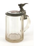 19th century cut glass stein with pewter lid, housing ceramic panel depicting a coat of arms, 17.5cm