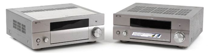 Two Yamaha AV receiver amplifiers comprising models RX-V4600 and RX-V1700.
