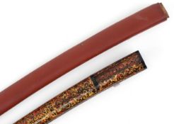 Two vintage Japanese wakizashi sword scabbards including a gilt lacquered example, 70cm and 53cm