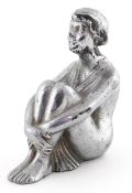 Art Deco chrome plated car mascot in the form of a seated female, 9cm high.