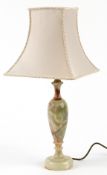 Onyx table lamp with cloth shade, 56cm high.
