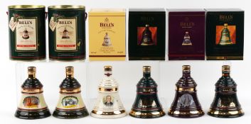 Six Bell's Christmas edition whisky decanters comprising 1990, 1991, 1992, 1995, 2002 and 2003.