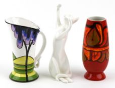 Three ceramic items comprising a Poole Delphis vase, brine wood art pottery jug titled Elm Field and