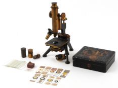 19th century W Watson & Sons table microscope with eye pieces and a small selection of glass slides,