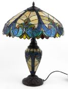 Tiffany style floral design table lamp with leaded glass shade, 64cm high.