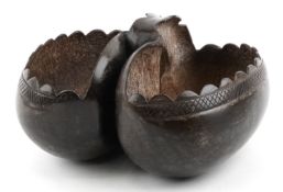 Tribal interest carved coco de mer nut with hand carved crosshatch design and scalloped edges,