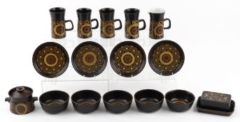 Brown Denby stoneware part tea set in the Arabesque pattern comprising four mugs, five side