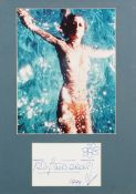 Topless colour photograph of Brigitte Bardot with signature, framed and glazed, overall 44cm x