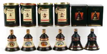 Six Bell's Christmas Edition whisky decanters comprising 1988, 1989, 1990, 1991, 1992 and 1993.