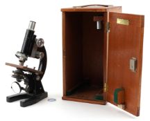J Swift & Son, vintage black enamel microscope with fitted case, inscribed Bedford College for Women