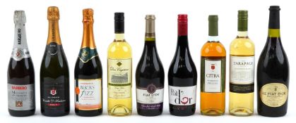 Nine bottles of alcohol comprising Tarapaca Sauvignon Blanc, Le Piat D'Or French red wine and