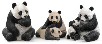 Three large composite model panda bears, the largest 54cm high.