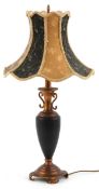 Ornate bronzed metal table lamp with embroidered silk lined shade, 74cm high.