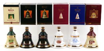 Six Bell's Extra Special Christmas Limited Edition whisky decanters comprising 1994, 1995, 1996,