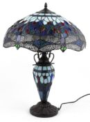 Tiffany style dragonfly design table lamp with leaded glass shade, 65cm high.