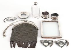 Antique and later silver and white metal objects including a chainmail purse, napkin rings, decanter