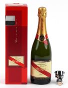 Bottle of Mumm Champagne with box.